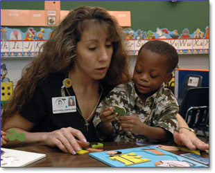 Child playing with puzzles